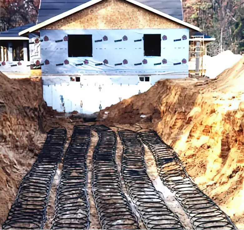 Geothermal path to a house being constructed